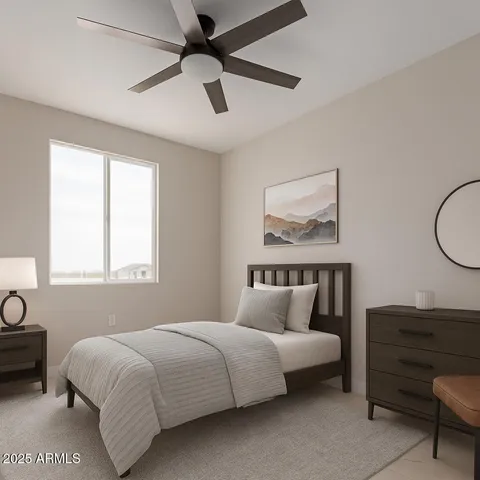 a bedroom with a bed lamp and a window