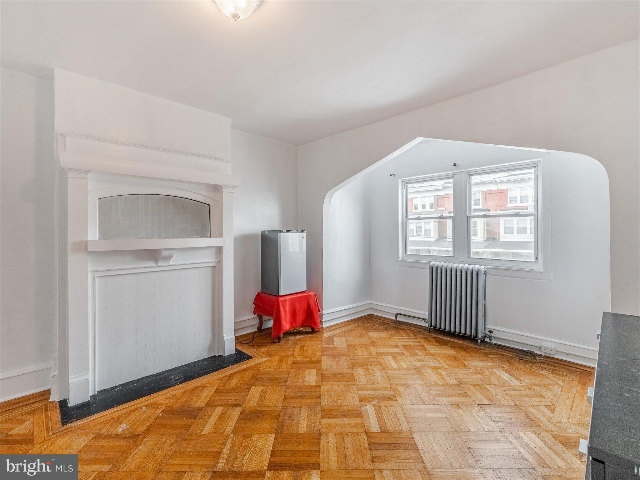 131 South 50th Street Philadelphia, PA 19139 - Photo 16 of 27 a bed room with a bed and a window