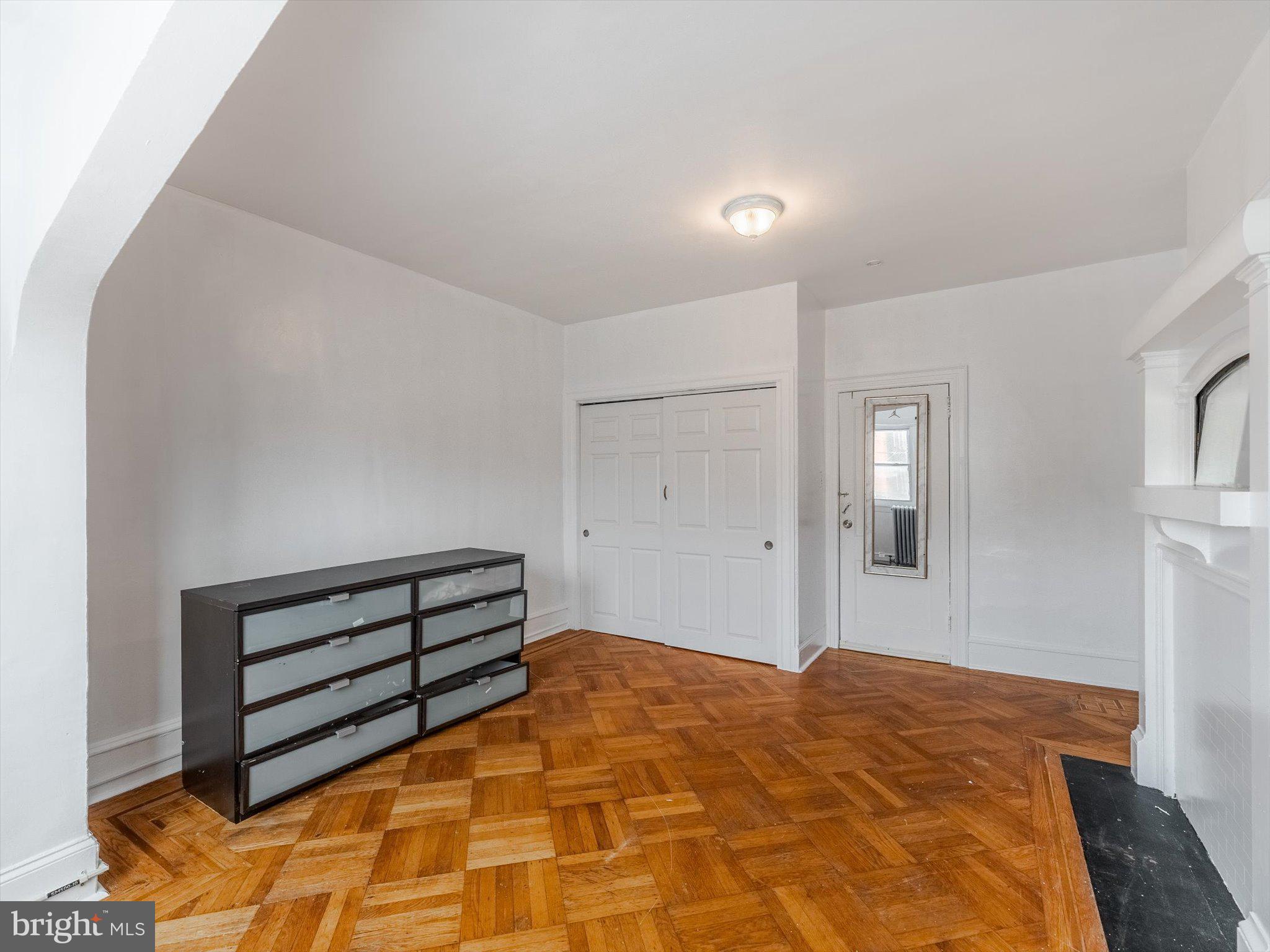 131 South 50th Street Philadelphia, PA 19139 - Photo 18 of 27 a bedroom with a bed and a cabinets