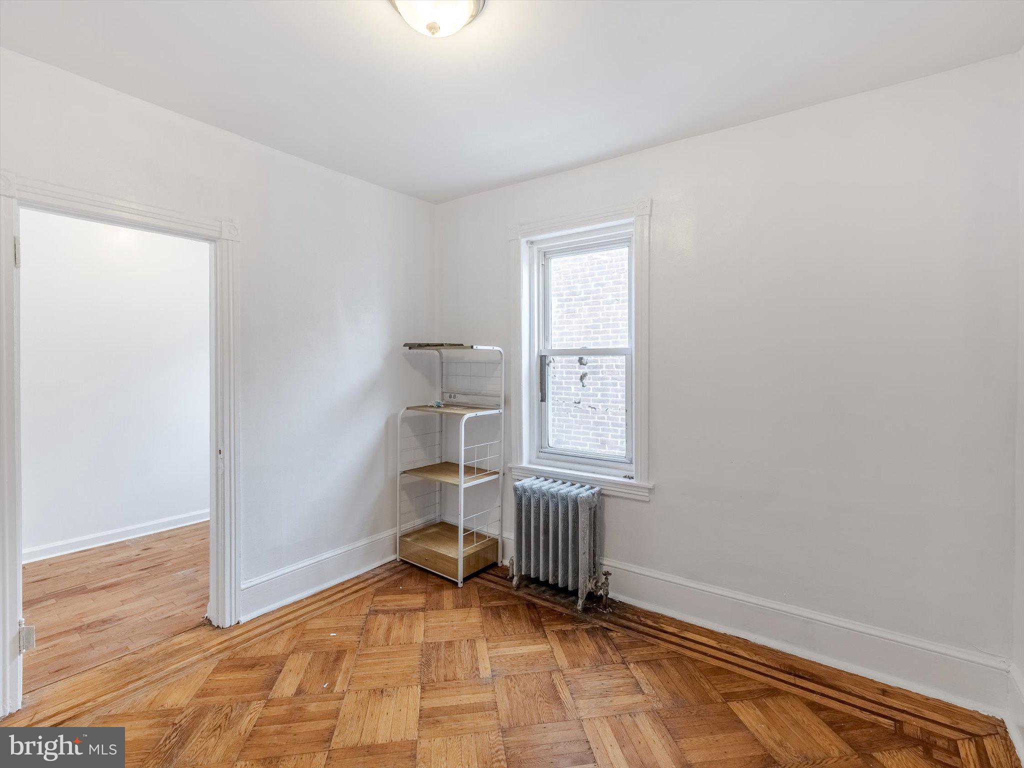 131 South 50th Street Philadelphia, PA 19139 - Photo 21 of 27 an empty room with windows