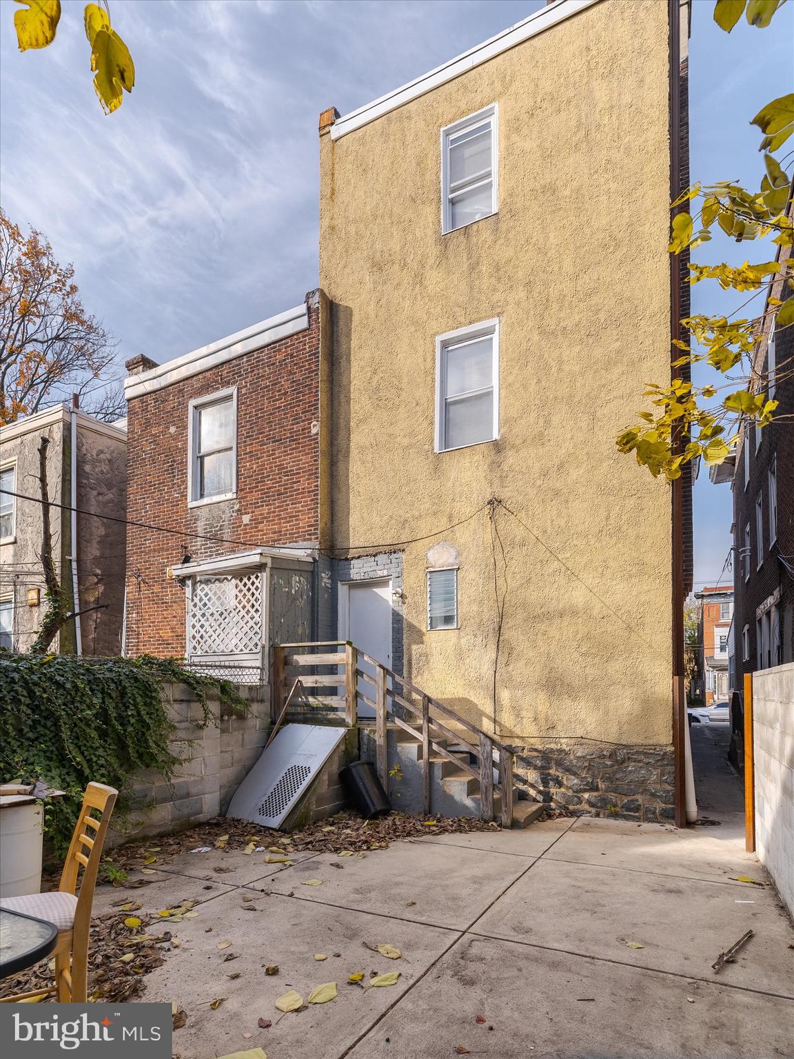 131 South 50th Street Philadelphia, PA 19139 - Photo 26 of 27 a view of a brick house with many windows