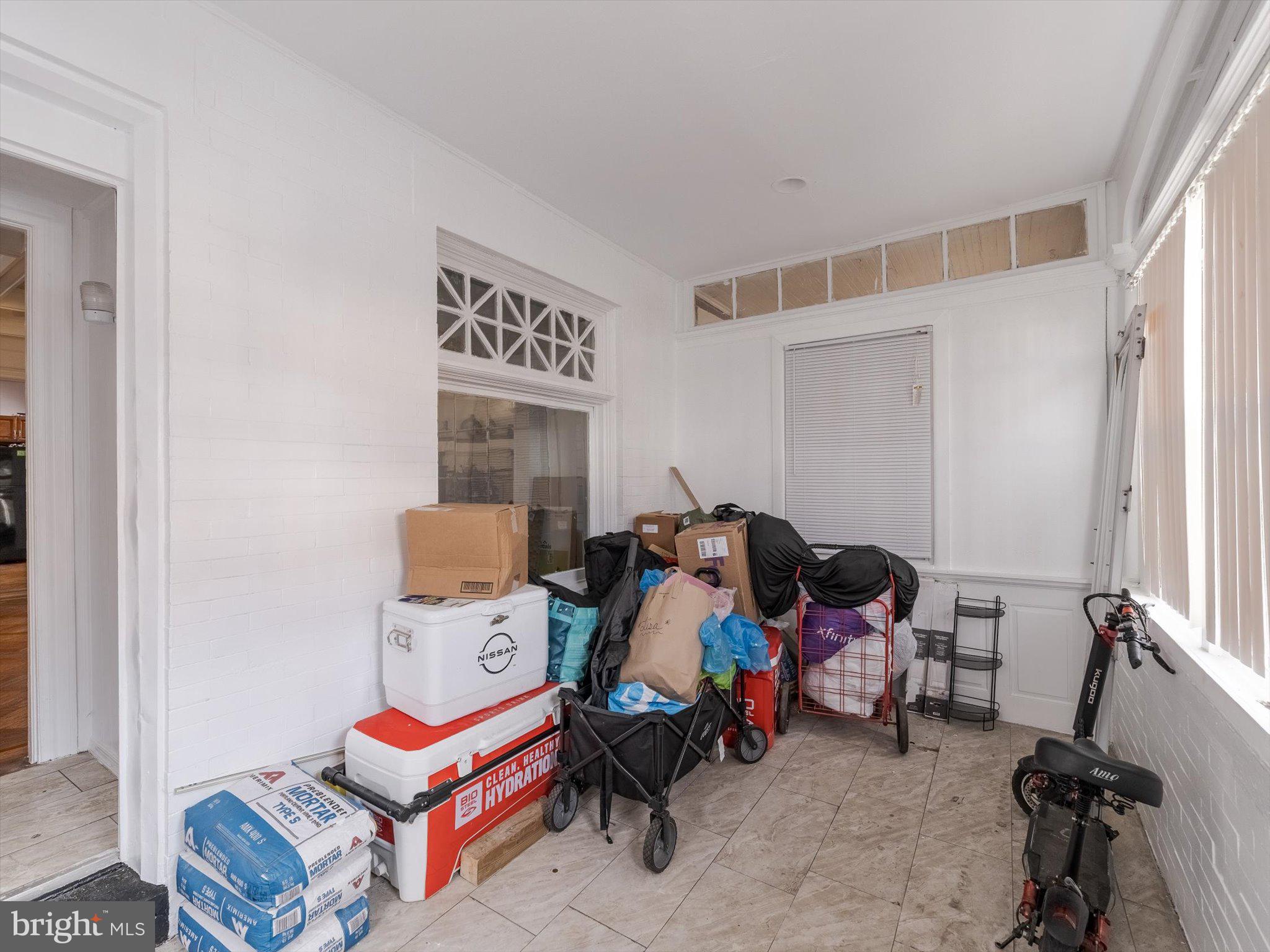 131 South 50th Street Philadelphia, PA 19139 - Photo 5 of 27 a bedroom with furniture and a window
