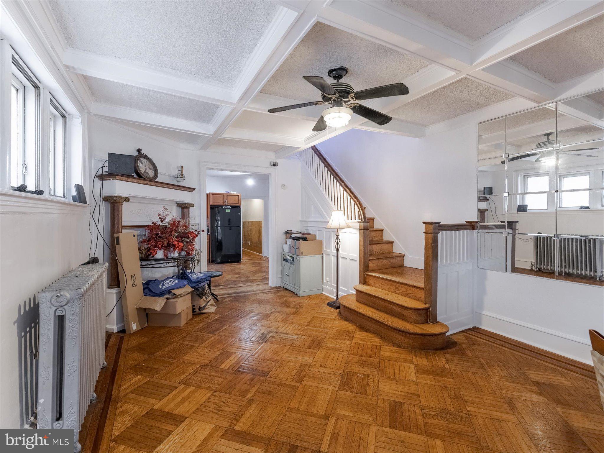 131 South 50th Street Philadelphia, PA 19139 - Photo 7 of 27 a view of a livingroom with furniture and a ceiling fan