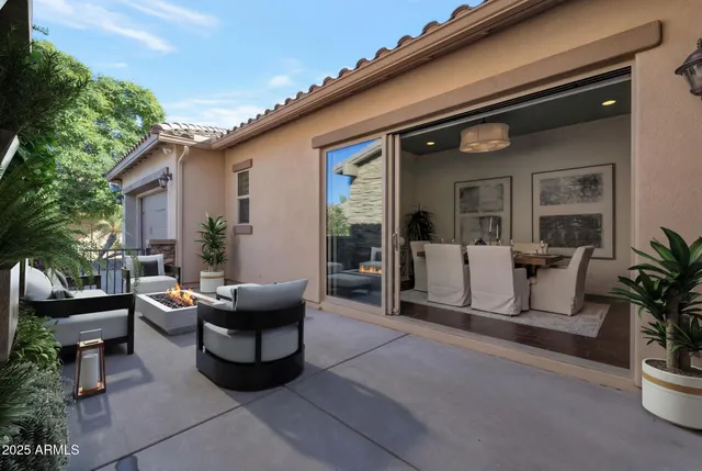 a building outdoor space with furniture and potted plants