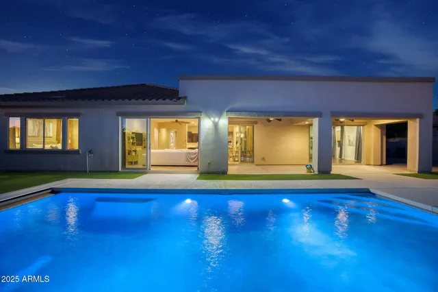 a view of an empty room with window and floor to ceiling window