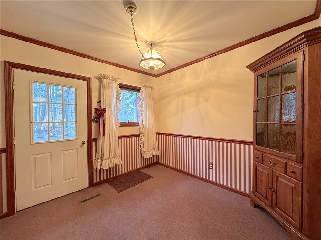 776 Highway 271 Ligonier, PA 15658 - Photo 17 of 29 wooden floor in an empty room with a window