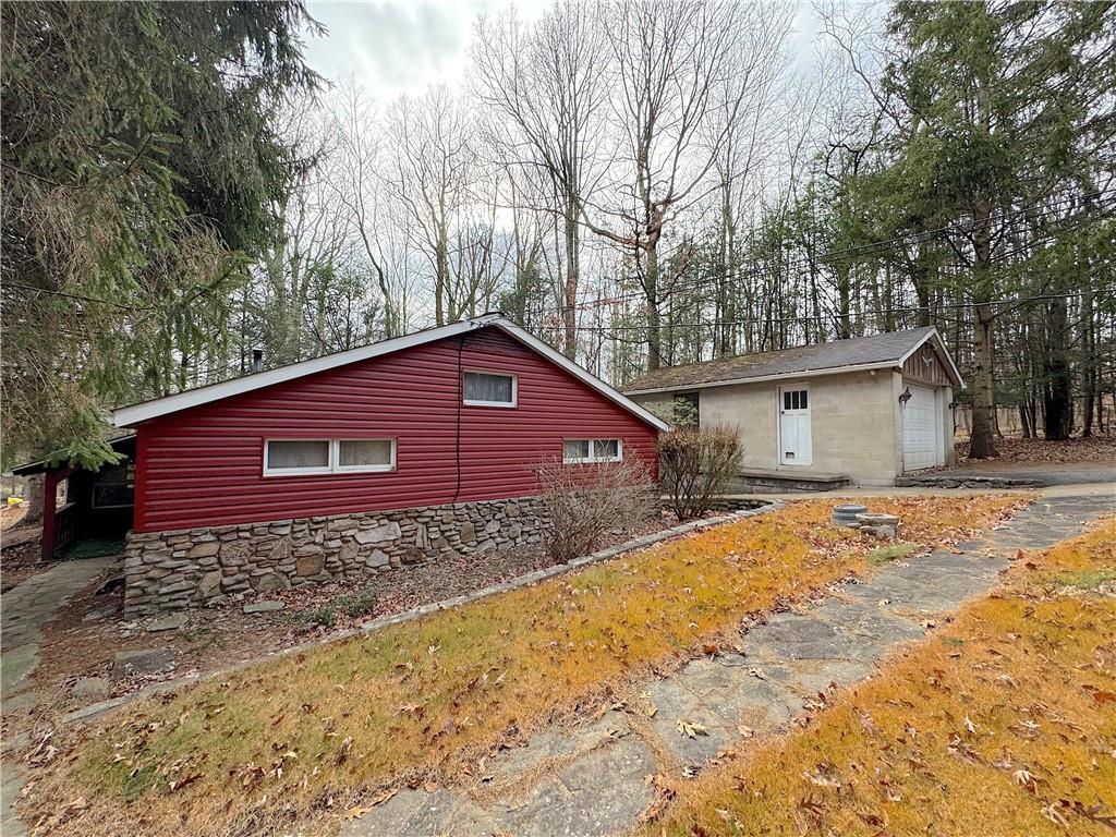776 Highway 271 Ligonier, PA 15658 - Photo 27 of 29 a view of a house with a yard