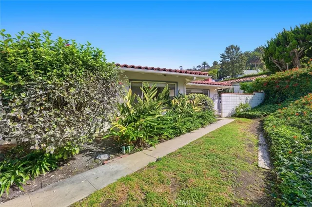 a balcony with a yard