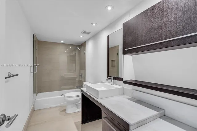 a view of a room with a large window