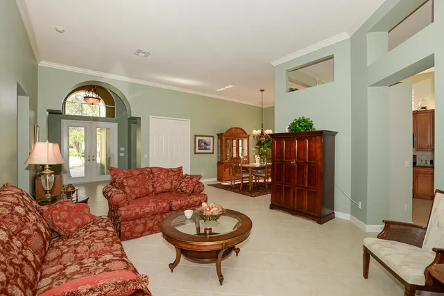 a kitchen with stainless steel appliances granite countertop a refrigerator a stove top oven a sink and dishwasher