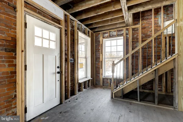 a view of an entryway with staircase