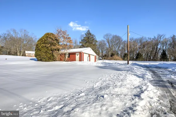 a view of a house with a snow