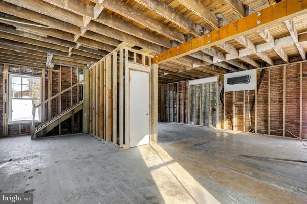 a view of an empty room with a garage