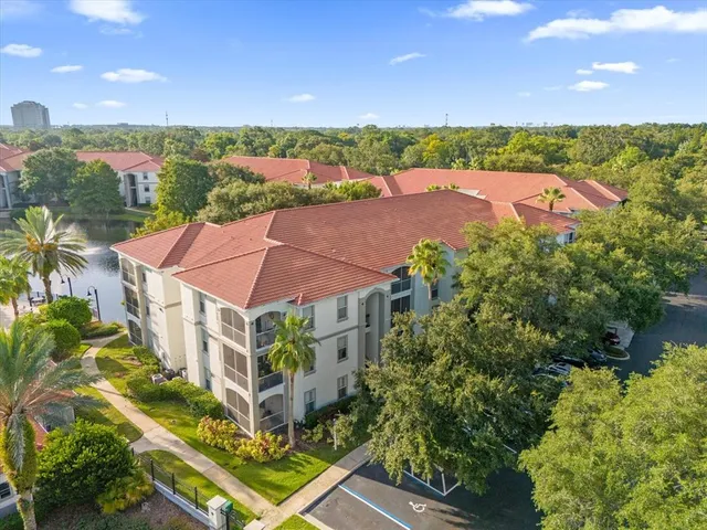 an aerial view of house with yard
