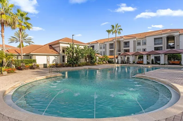 a view of a house with swimming pool