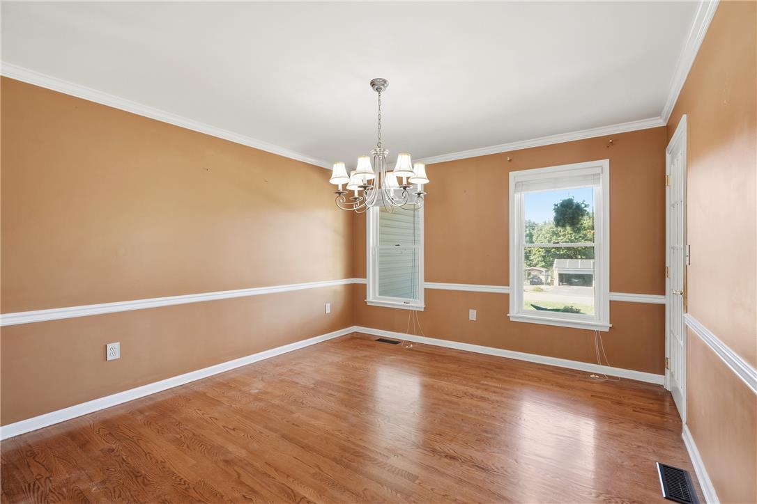 590 Fehr Road Nazareth, PA 18064 - Photo 22 of 79 Gleaming hardwood floors and classic chair rail molding define this versatile dining space.
