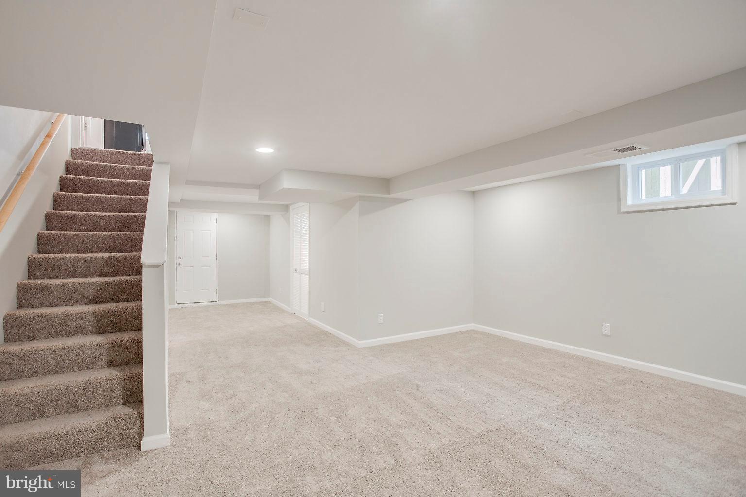 2156 Coralthorn Road Baltimore, MD 21220 - Photo 23 of 37 Lower level recreation room w/new carpet