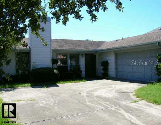 4354 Reeves Road New Port Richey, FL 34652 - Photo 1 of 1 Exterior Front - front of house/side mount garage/lots of parking in drive