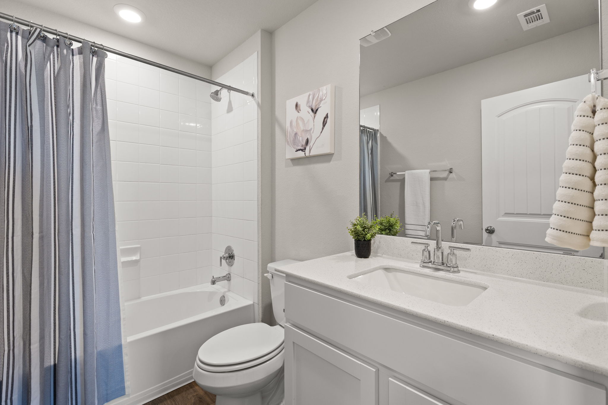 281 Jayden Drive Kyle, TX 78640 - Photo 29 of 36 White vanity with an integrated sink, polished chrome faucet, and a light-toned countertop