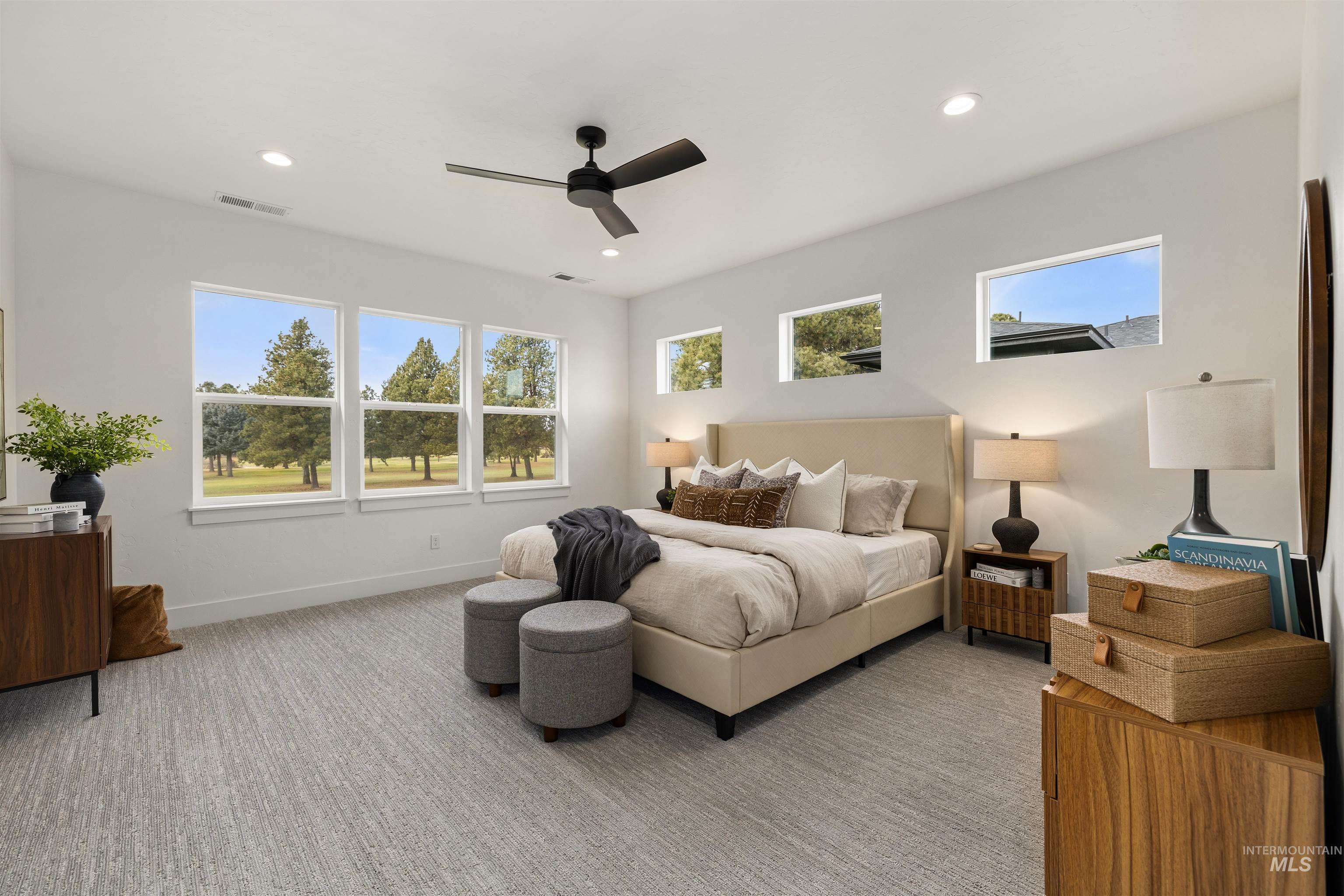 611 North Hiltonhead Way Eagle, ID 83616 - Photo 22 of 37 Bedroom with ceiling fan, recessed lighting, and light colored carpet. Photo Similar.