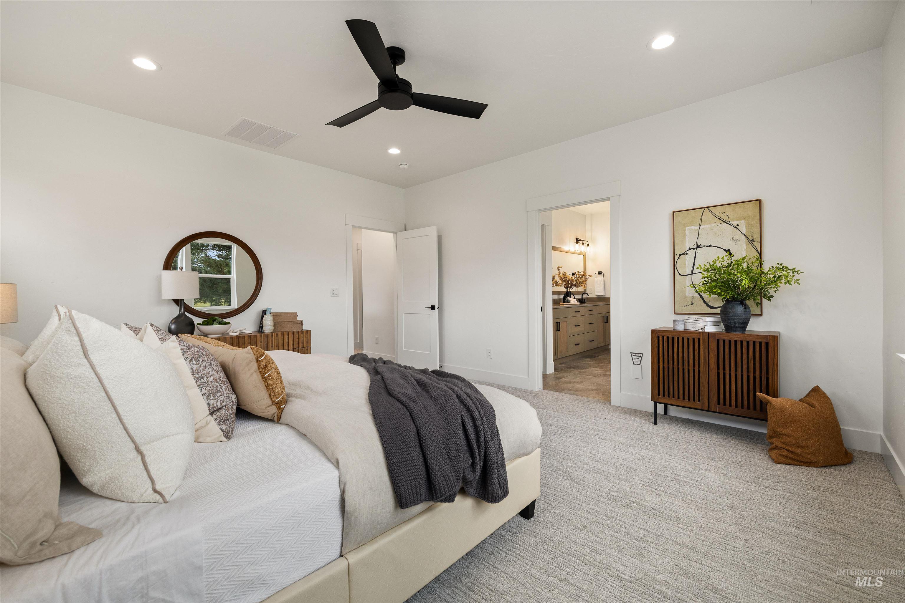 611 North Hiltonhead Way Eagle, ID 83616 - Photo 24 of 38 Carpeted bedroom with a ceiling fan, connected bathroom, and recessed lighting
