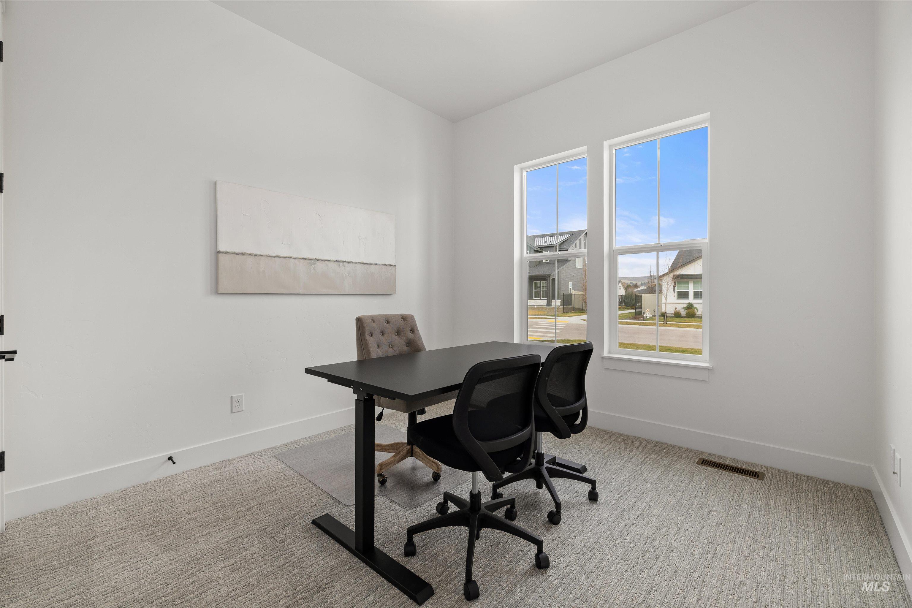 611 North Hiltonhead Way Eagle, ID 83616 - Photo 4 of 37 Office with light colored carpet and baseboards. Photo Similar.