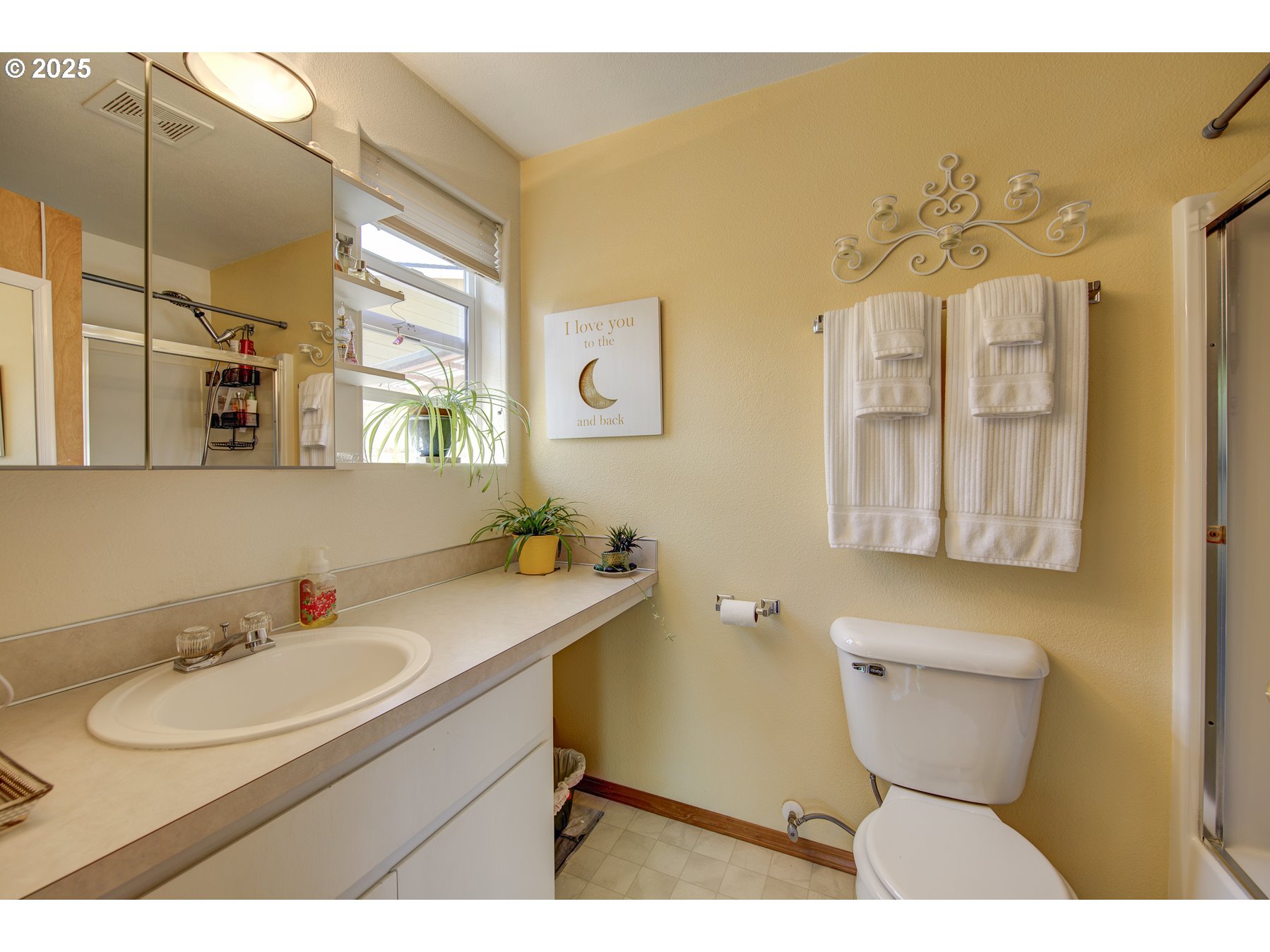 212 Northeast 148th Avenue Portland, OR 97230 - Photo 15 of 23 a bathroom with a sink mirror and toilet