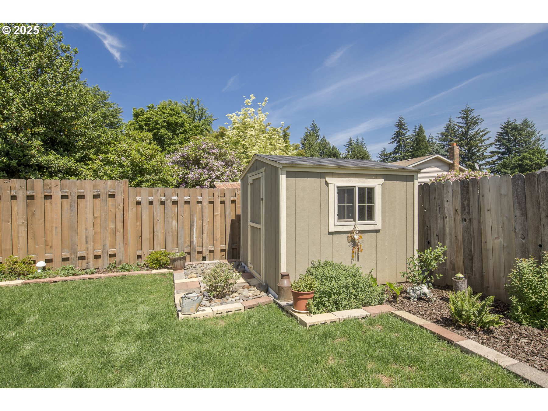 212 Northeast 148th Avenue Portland, OR 97230 - Photo 21 of 23 a backyard of a house with lots of green space