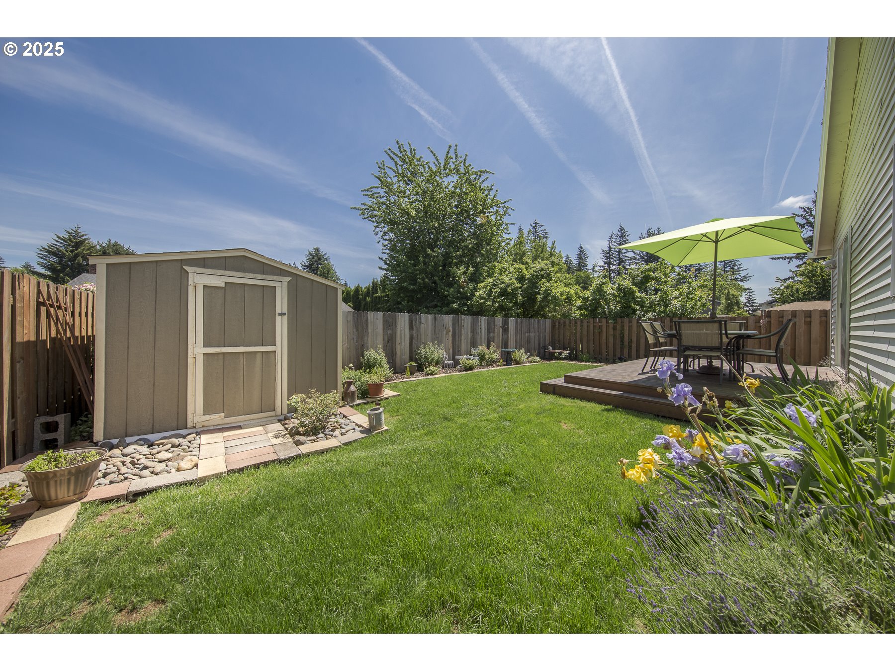 212 Northeast 148th Avenue Portland, OR 97230 - Photo 23 of 23 a backyard of a house with table and chairs