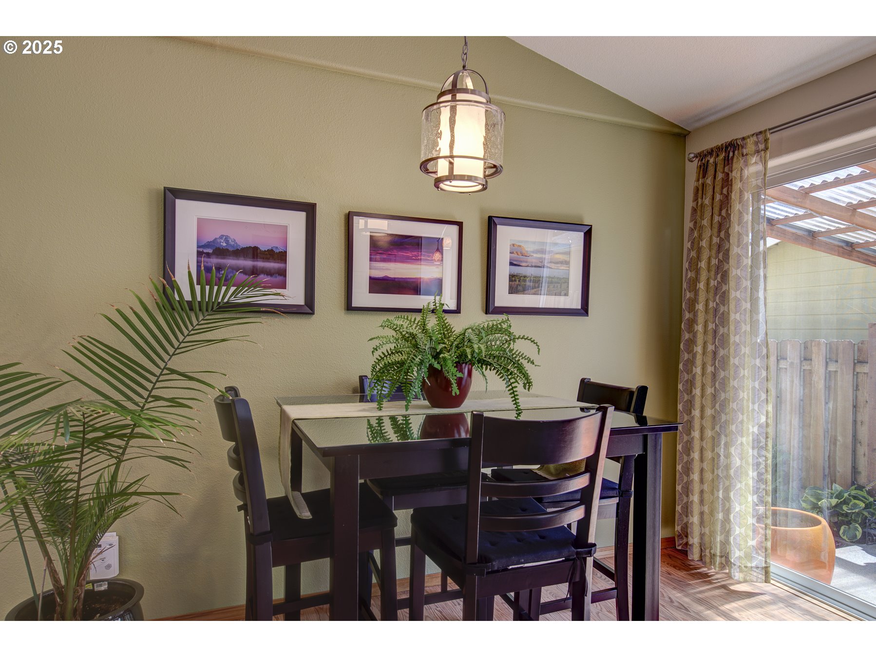 212 Northeast 148th Avenue Portland, OR 97230 - Photo 10 of 23 a view of a dining room with furniture and a chandelier