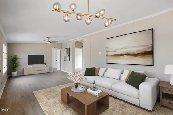 a living room with furniture and a flat screen tv