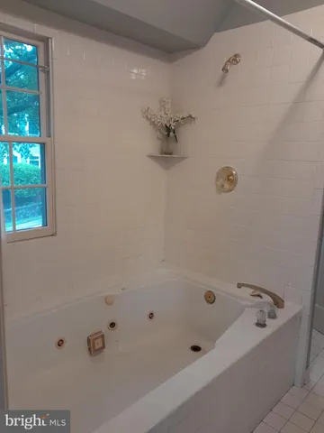 a bathroom with a bathtub