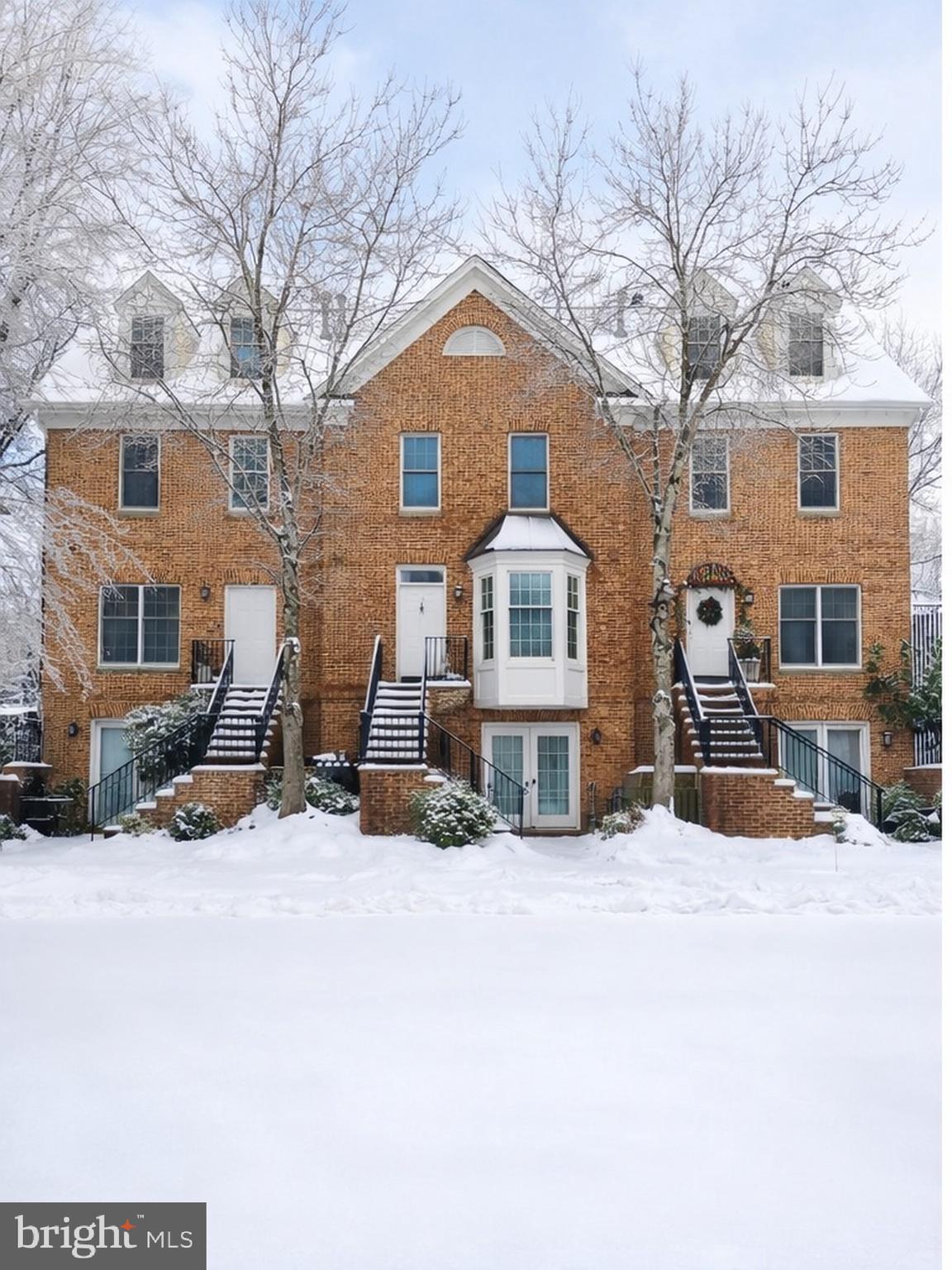 100 Fox Run Terrace Middleburg, VA 20117 - Photo 3 of 14 a front view of a house with a yard covered in snow