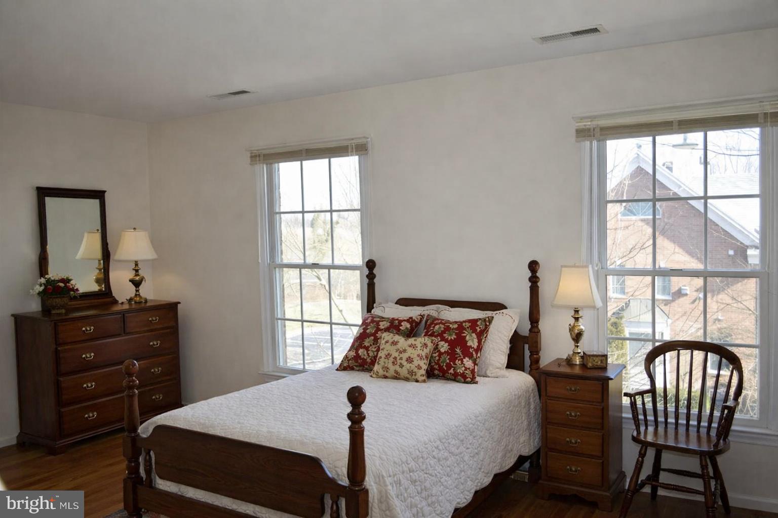 100 Fox Run Terrace Middleburg, VA 20117 - Photo 6 of 14 a bedroom with a bed and wooden floor