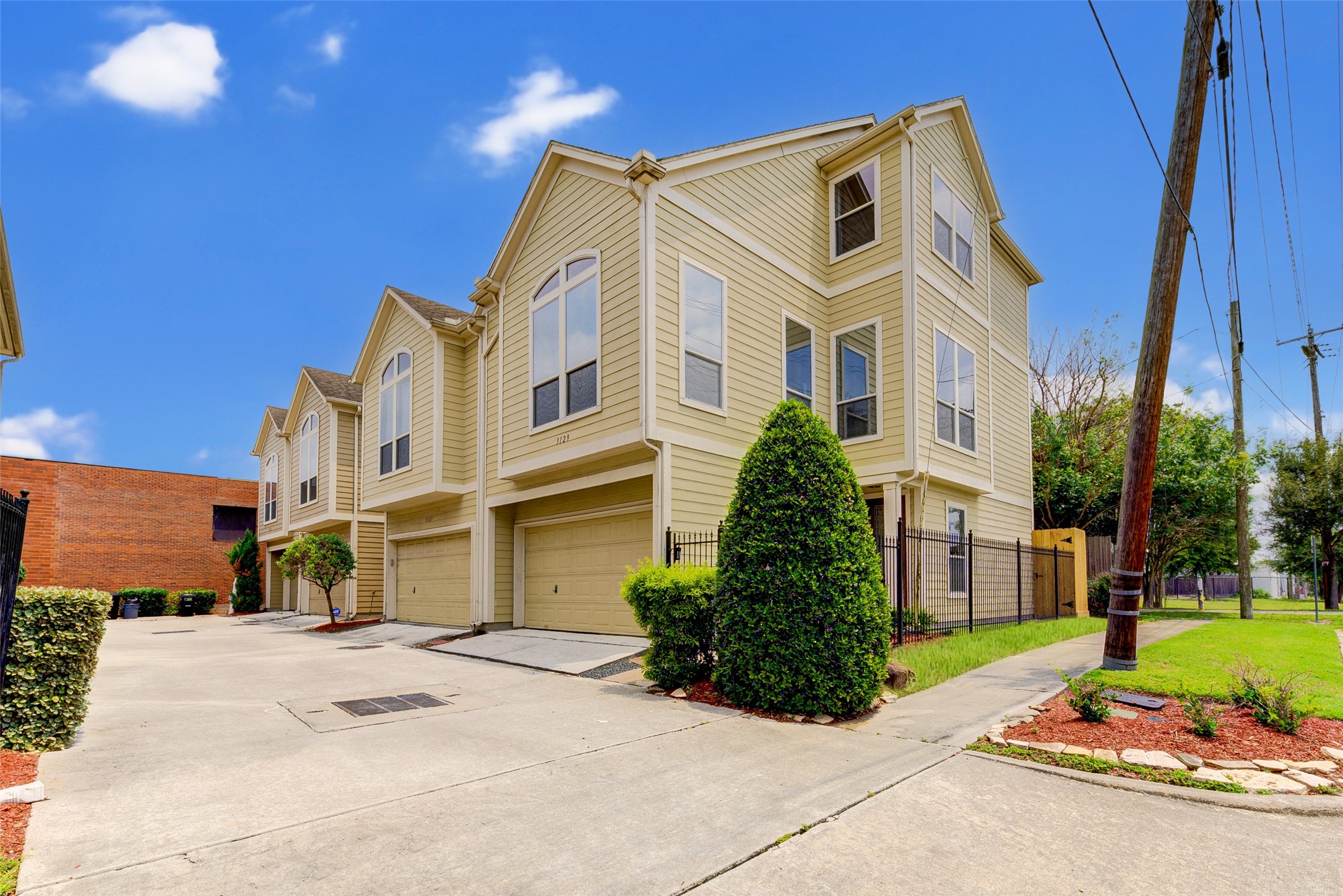 3129 Dallas Street Houston, TX 77003 - Photo 2 of 24 a front view of a house with a yard