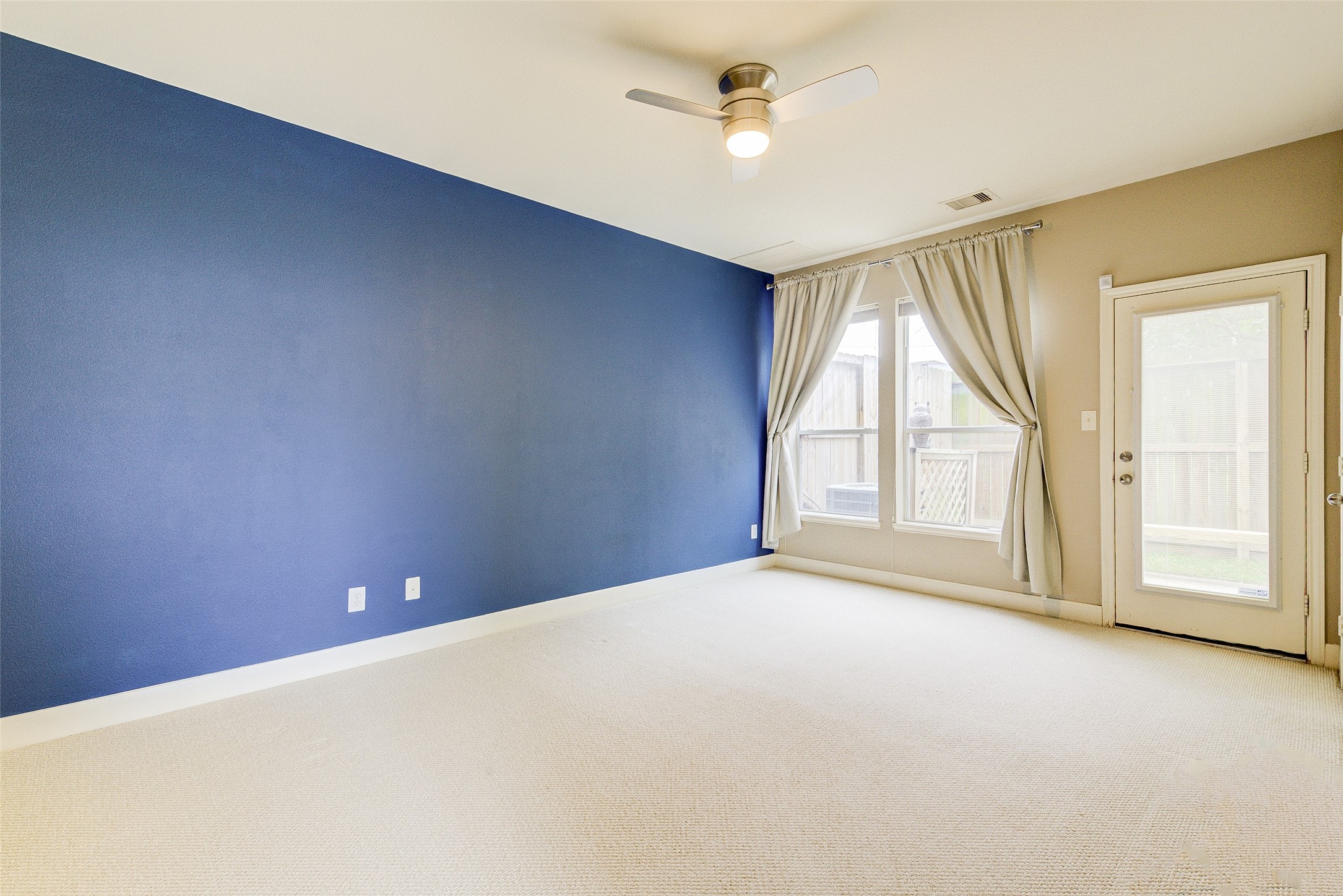 3129 Dallas Street Houston, TX 77003 - Photo 6 of 24 a view of an empty room with a window