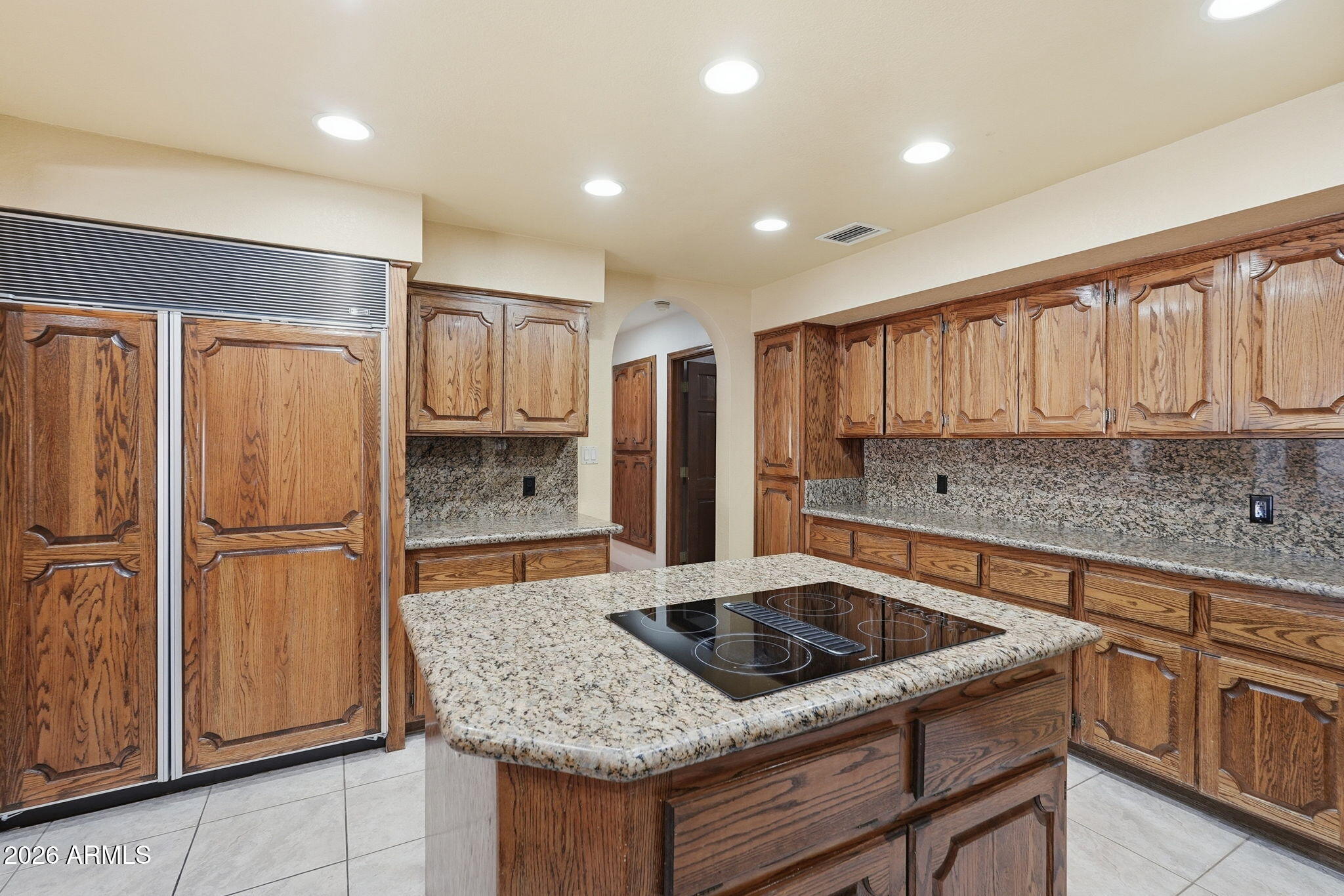 602 East Carver Road Tempe, AZ 85284 - Photo 22 of 85 a kitchen with granite countertop a sink stove and refrigerator