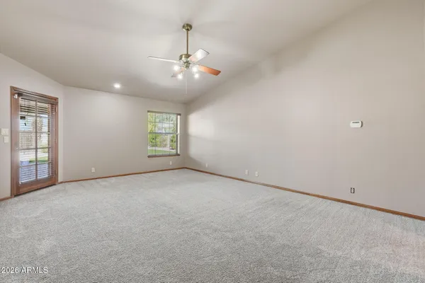 a view of an empty room with stairs