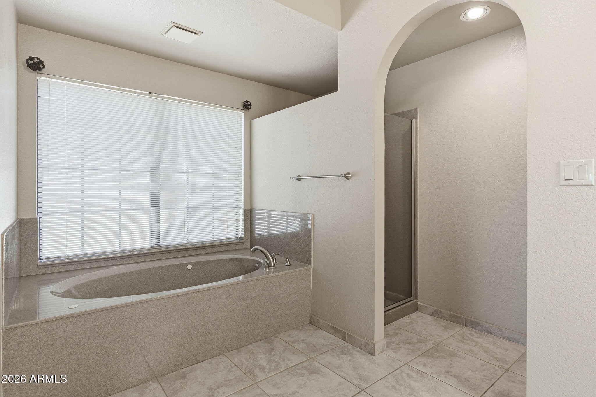 602 East Carver Road Tempe, AZ 85284 - Photo 31 of 85 a bathroom with a bathtub and shower