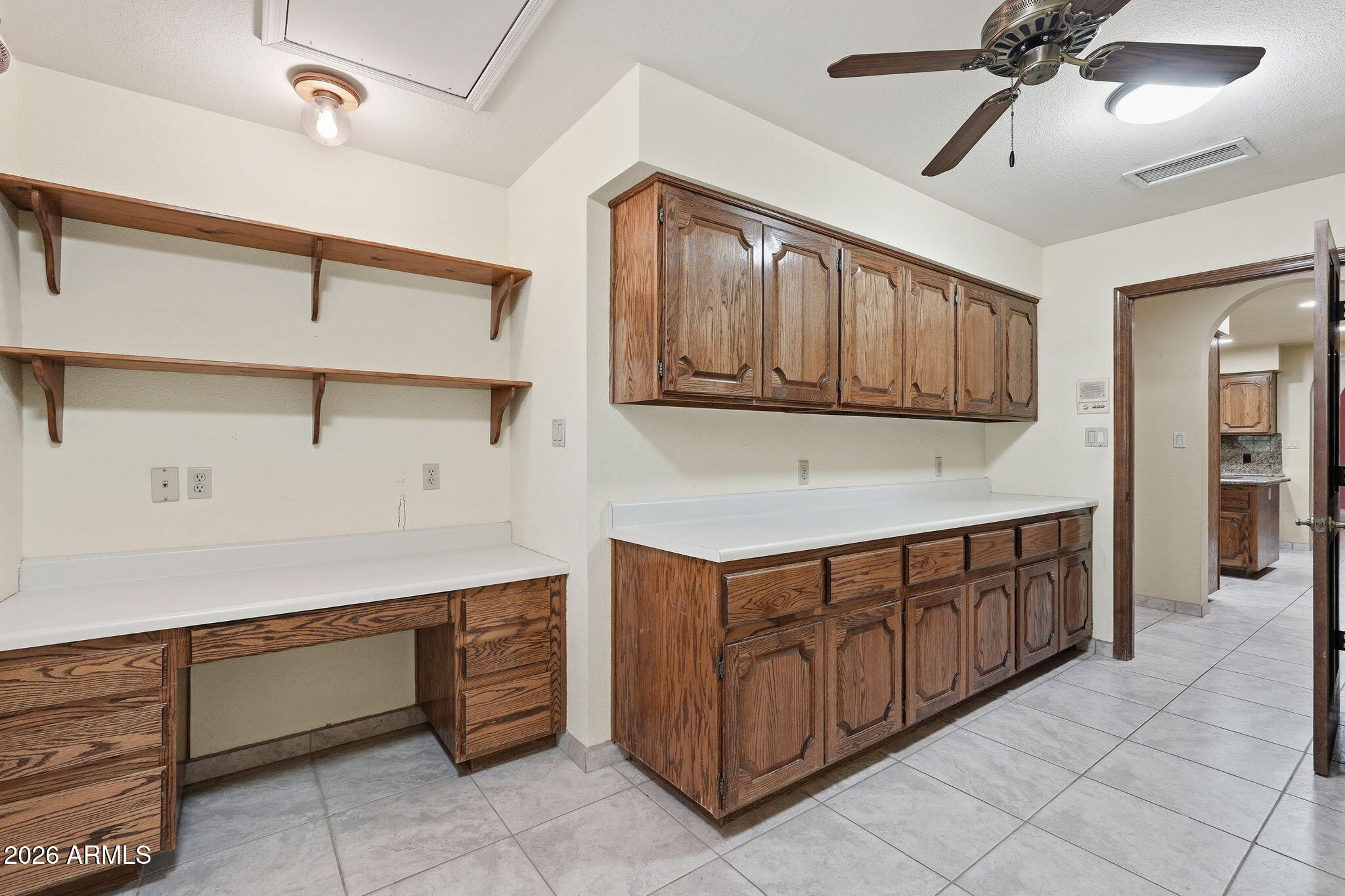 602 East Carver Road Tempe, AZ 85284 - Photo 41 of 85 a kitchen with kitchen island cabinets and window