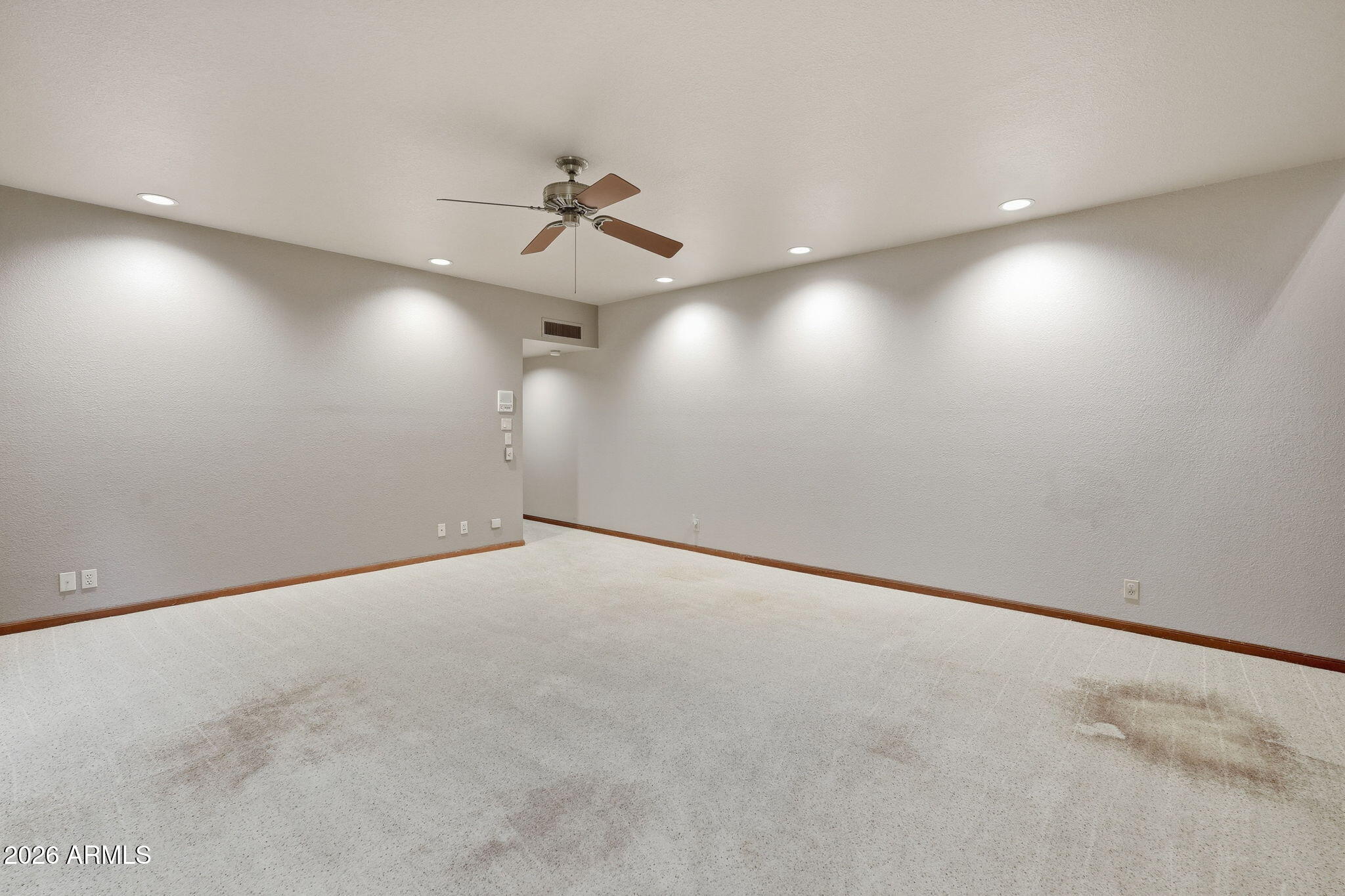 602 East Carver Road Tempe, AZ 85284 - Photo 44 of 85 an empty room with a ceiling fan and window