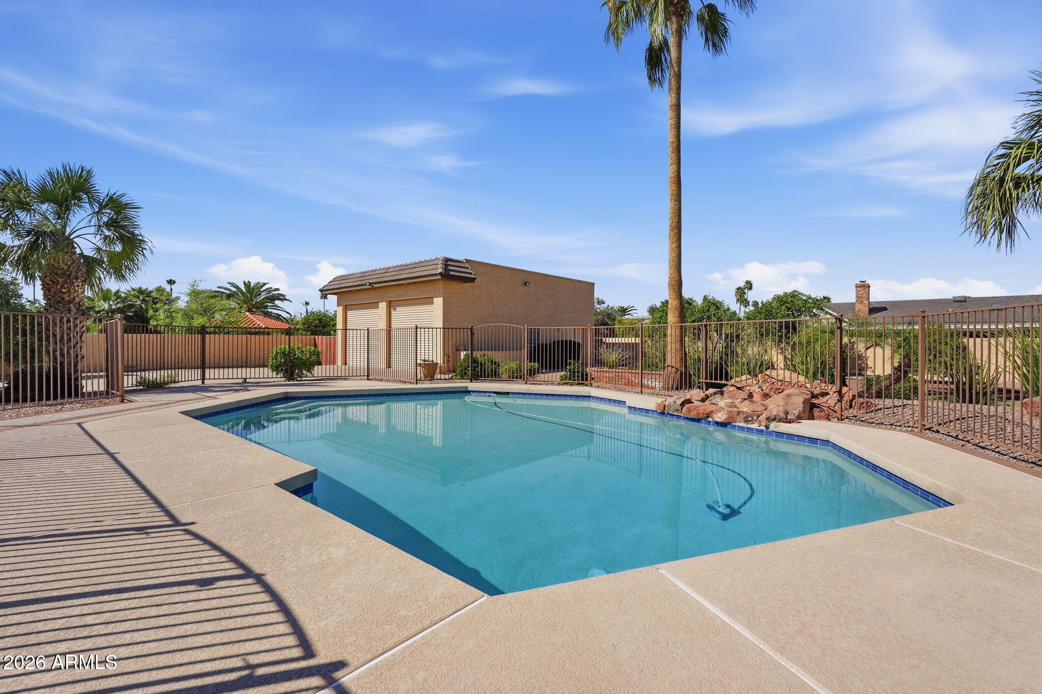 602 East Carver Road Tempe, AZ 85284 - Photo 63 of 85 a view of a swimming pool with a yard