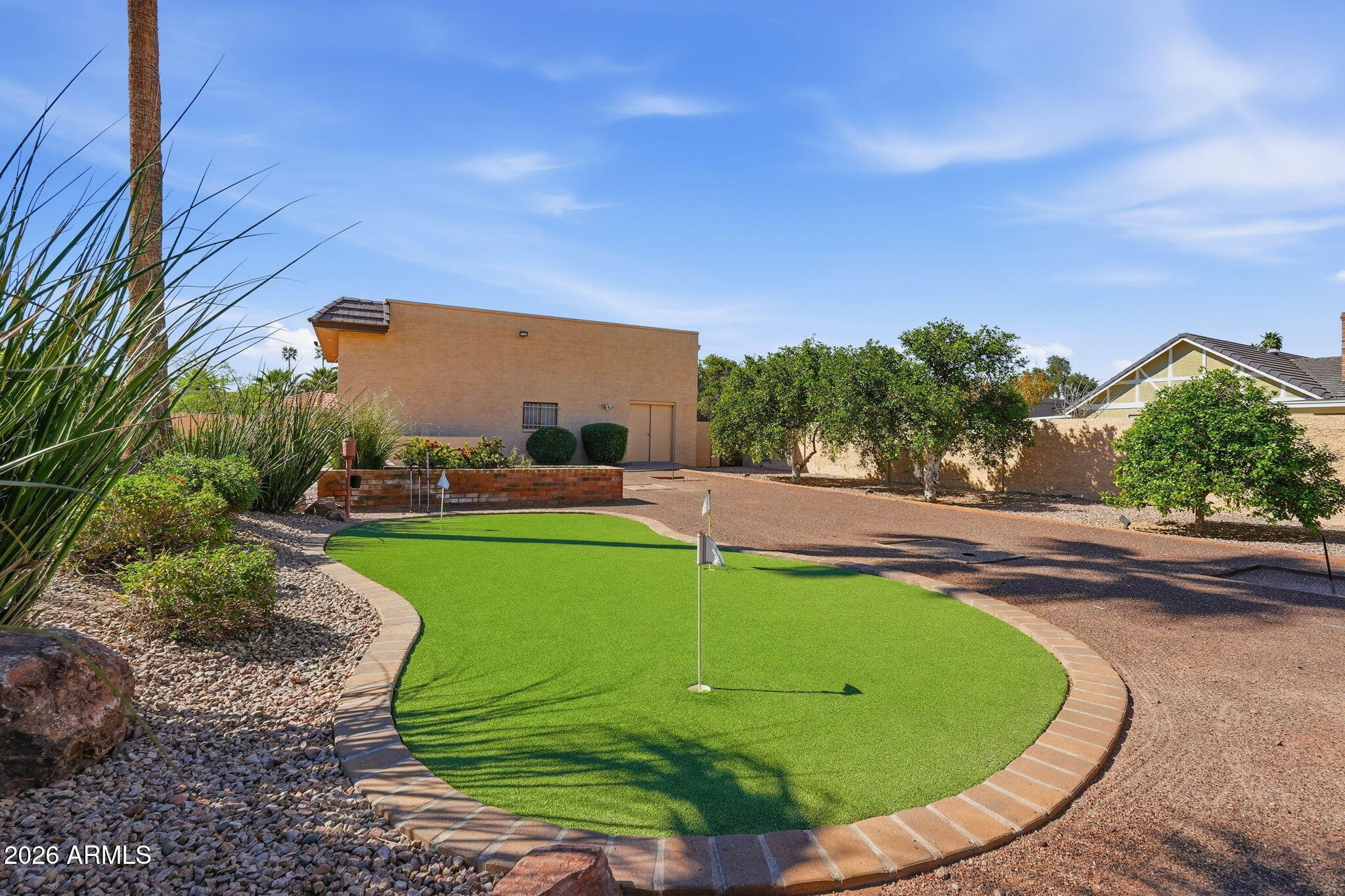 602 East Carver Road Tempe, AZ 85284 - Photo 65 of 85 a view of a swimming pool with a yard