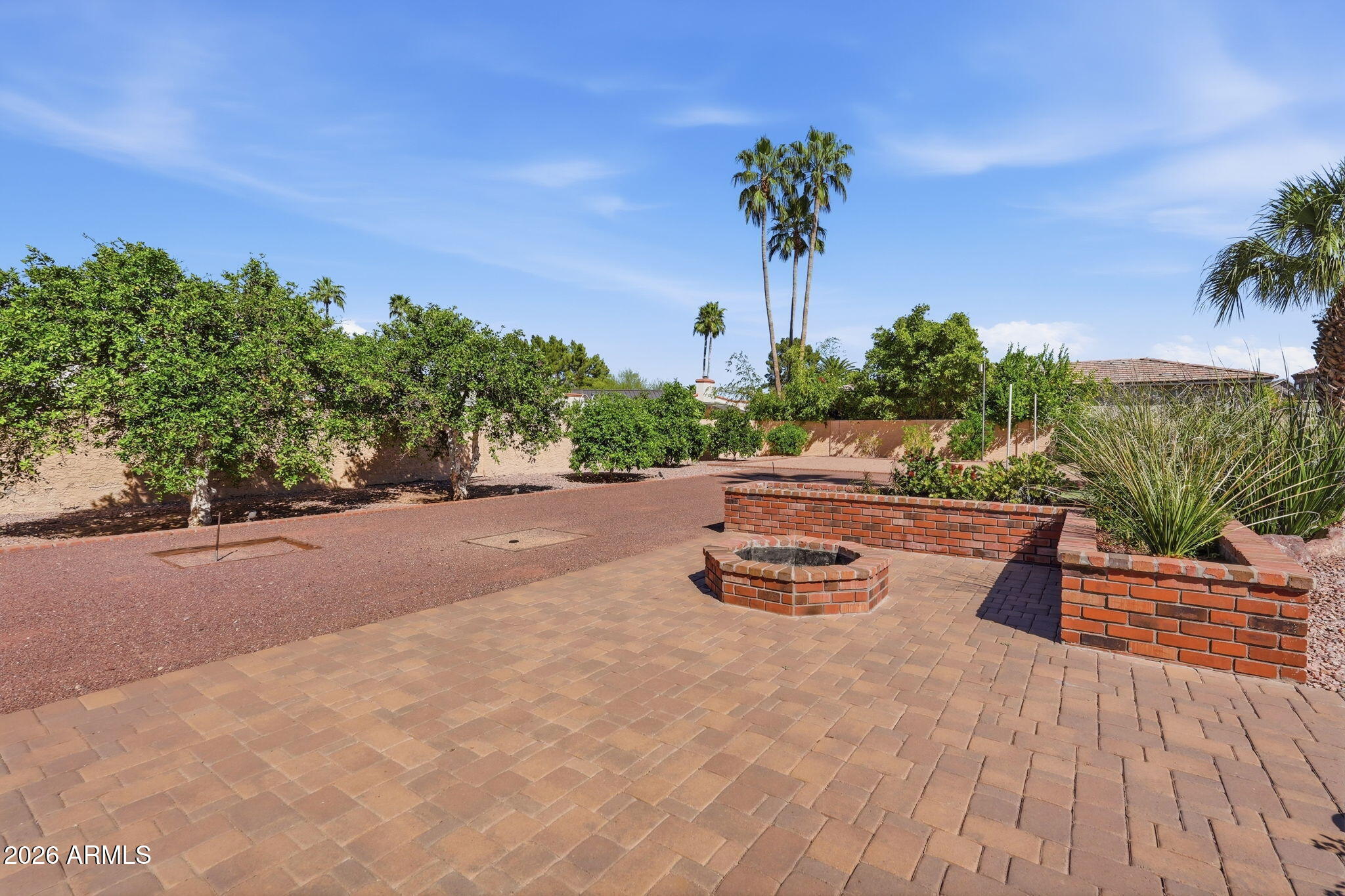 602 East Carver Road Tempe, AZ 85284 - Photo 66 of 85 a view of a terrace with a garden