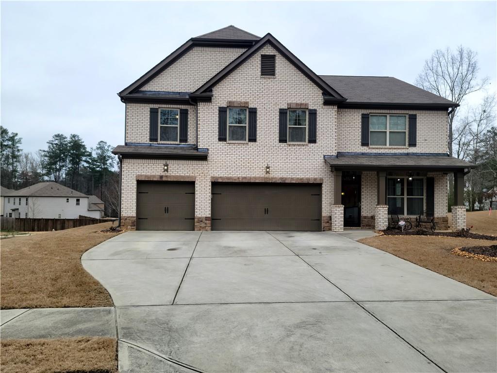 3579 Bartows Bridge Road Powder Springs, GA 30127 - Photo 1 of 1 a front view of a house with yard