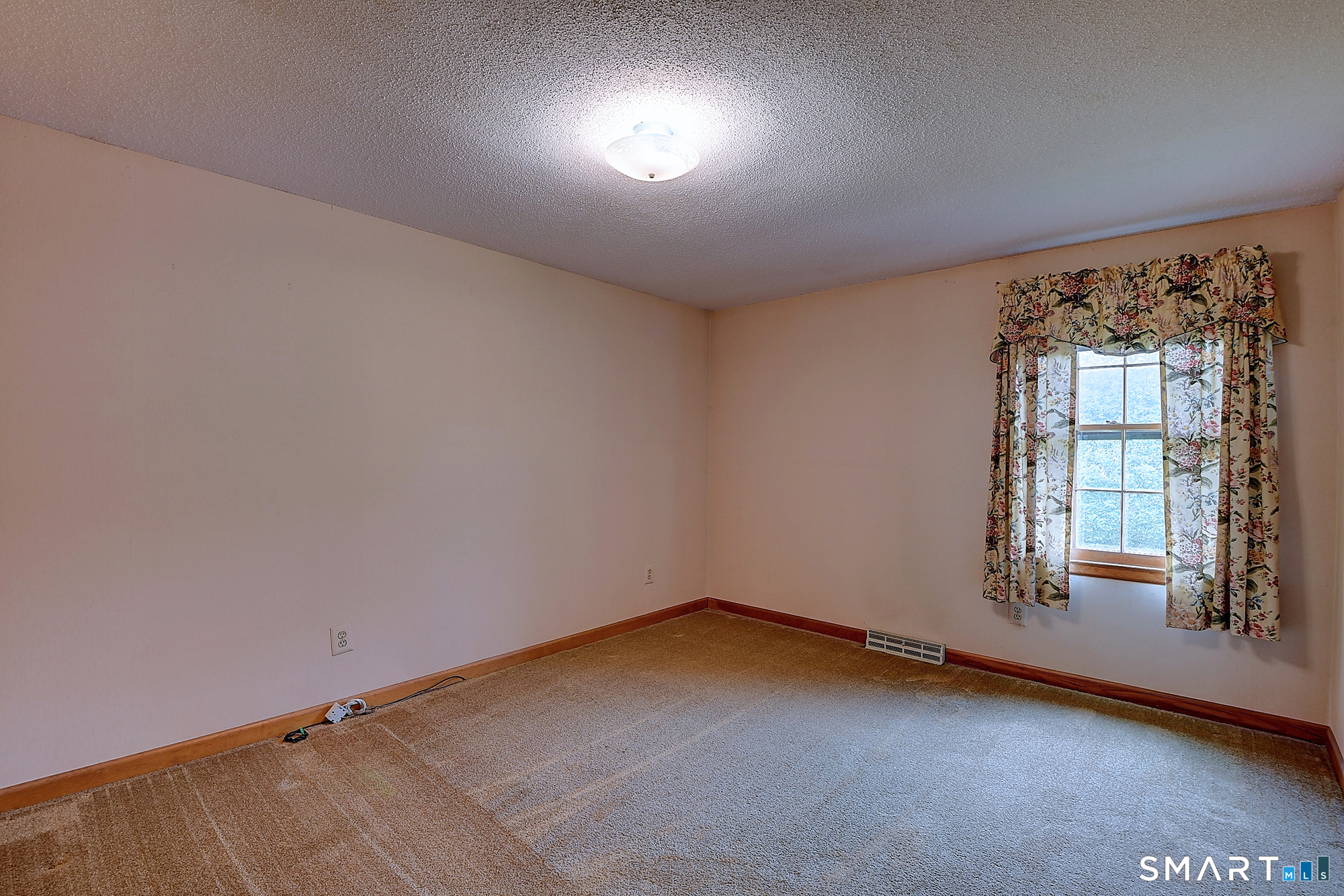 80 Grist Mill Road Wethersfield, CT 06109 - Photo 29 of 40 an empty room with a window