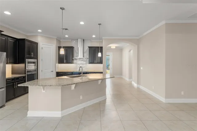 a bathroom with a double vanity sink and mirror