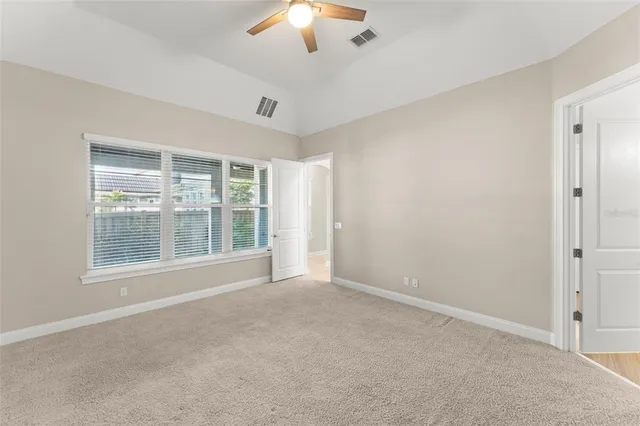 a view of a house with swimming pool garden and patio