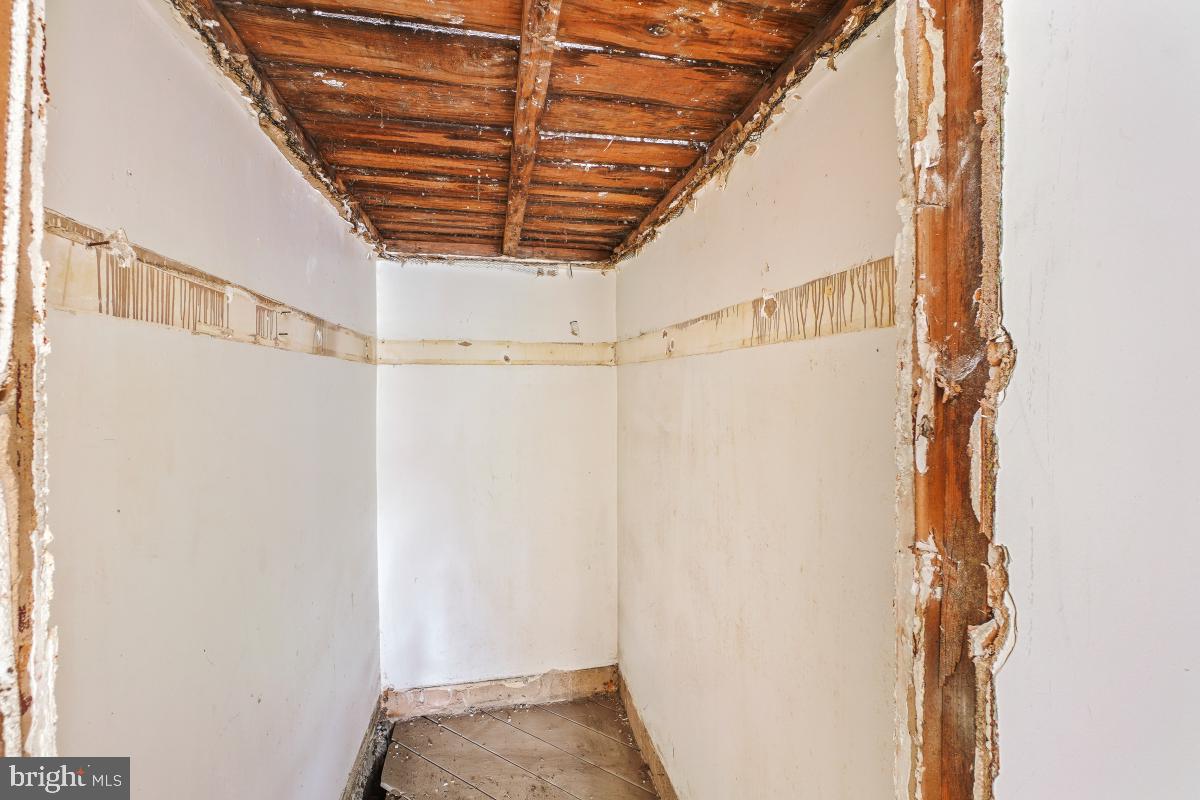 1280 16th Street Northeast Washington, DC 20002 - Photo 18 of 33 a view of a room with racks on the wall