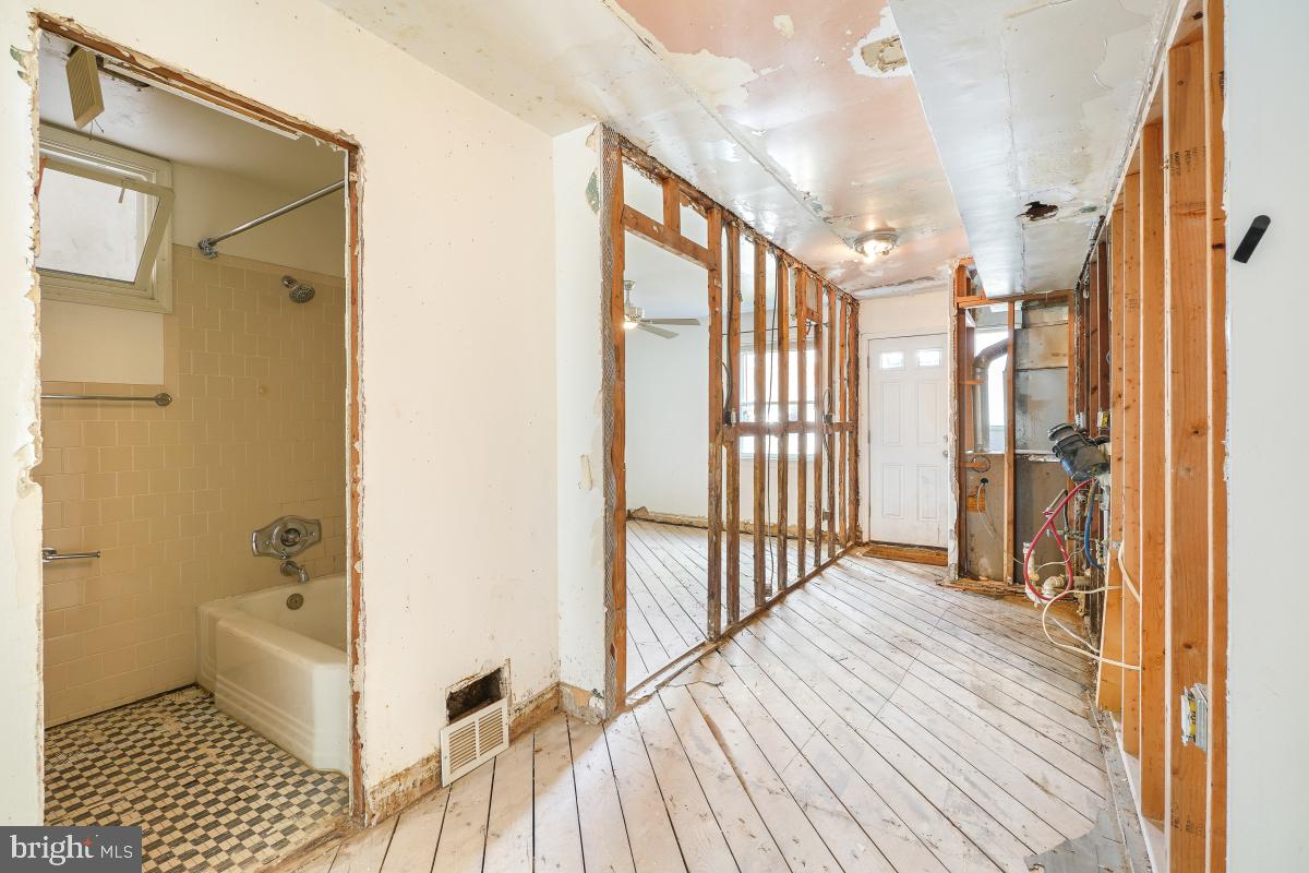 1280 16th Street Northeast Washington, DC 20002 - Photo 20 of 33 a bathroom with a bathtub and a shower